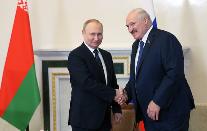 Russian President Vladimir Putin meets with Belarusian President Alexander Lukashenko in St Petersburg, Russia, 25 June.