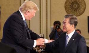 South Korean President Moon Jae-in makes a toast with Donald Trump at a state banquet in Seoul.