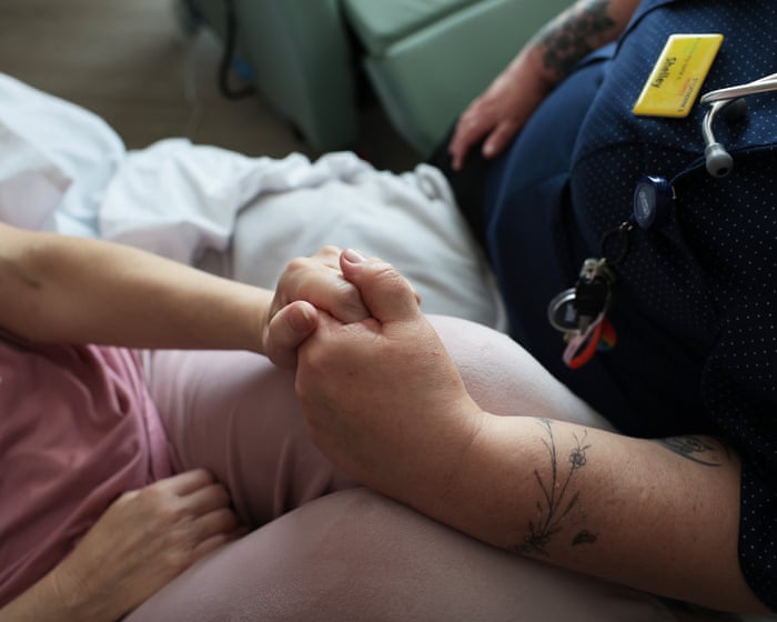 Hundreds of hospice beds and staff cut in England  amid funding crisis