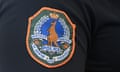 The emblem of the Northern Territory Police is seen in Darwin, Tuesday, May 14, 2024. The Northern Territory Chief Minister and Treasurer Eva Lawler has handed down the 2024-2025 budget on Tuesday. (AAP Image/Darren England) NO ARCHIVING