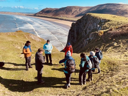 Group on walk on Wales coast