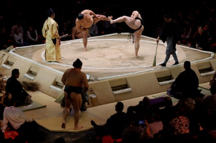 Before they fight, two rikishi perform the thunderous shiko, or leg-stomping, intended to drive away evil spirits