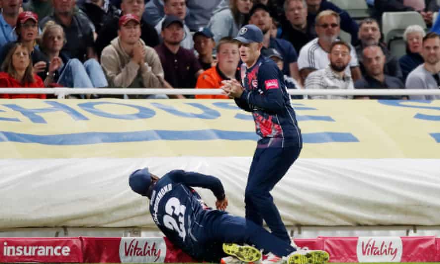 Kent’s Jordan Cox (right) and Daniel Bell-Drummond collide after Cox had caught Will Smeed. The catch was deemed illegal, leaving Cox fuming.