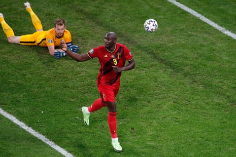 Belgium’s forward Romelu Lukaku (R) celebrates after scoring, before VAR ruled the goal offside.