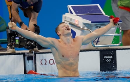 The British swimmer Adam Ramsay-Peaty celebrates victory in the men’s 100m breaststroke final at the Rio Olympics.