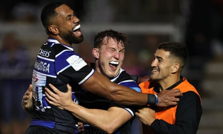 Ted Hill (centre) celebrates with Bath teammates Joe Cokanasiga (left) and Orlando Bailey after scoring their second try.