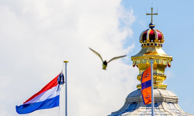 Princess Amalia’s rucksack hangs next to the Dutch national flag at the palace on Thursday.