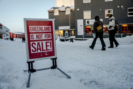 A sign reading “Greenland is not for sale!” is seen in Nuuk, Greenland.