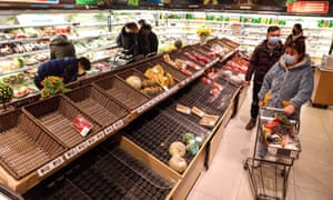 Empty shelves at a supermarket in Wuhan.