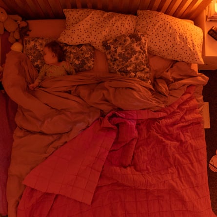 18-month-old Brooke alone in her parents’ bed (time 20.38)