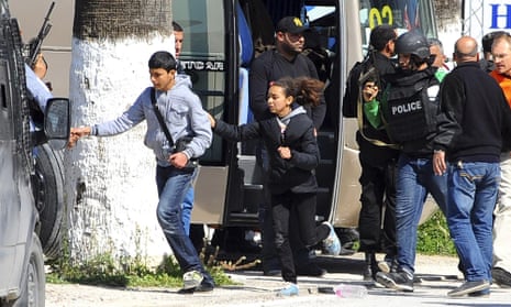 Tourists and visitors from the Bardo museum are evacuated in Tunis, on Wednesday, 18 March, 2015