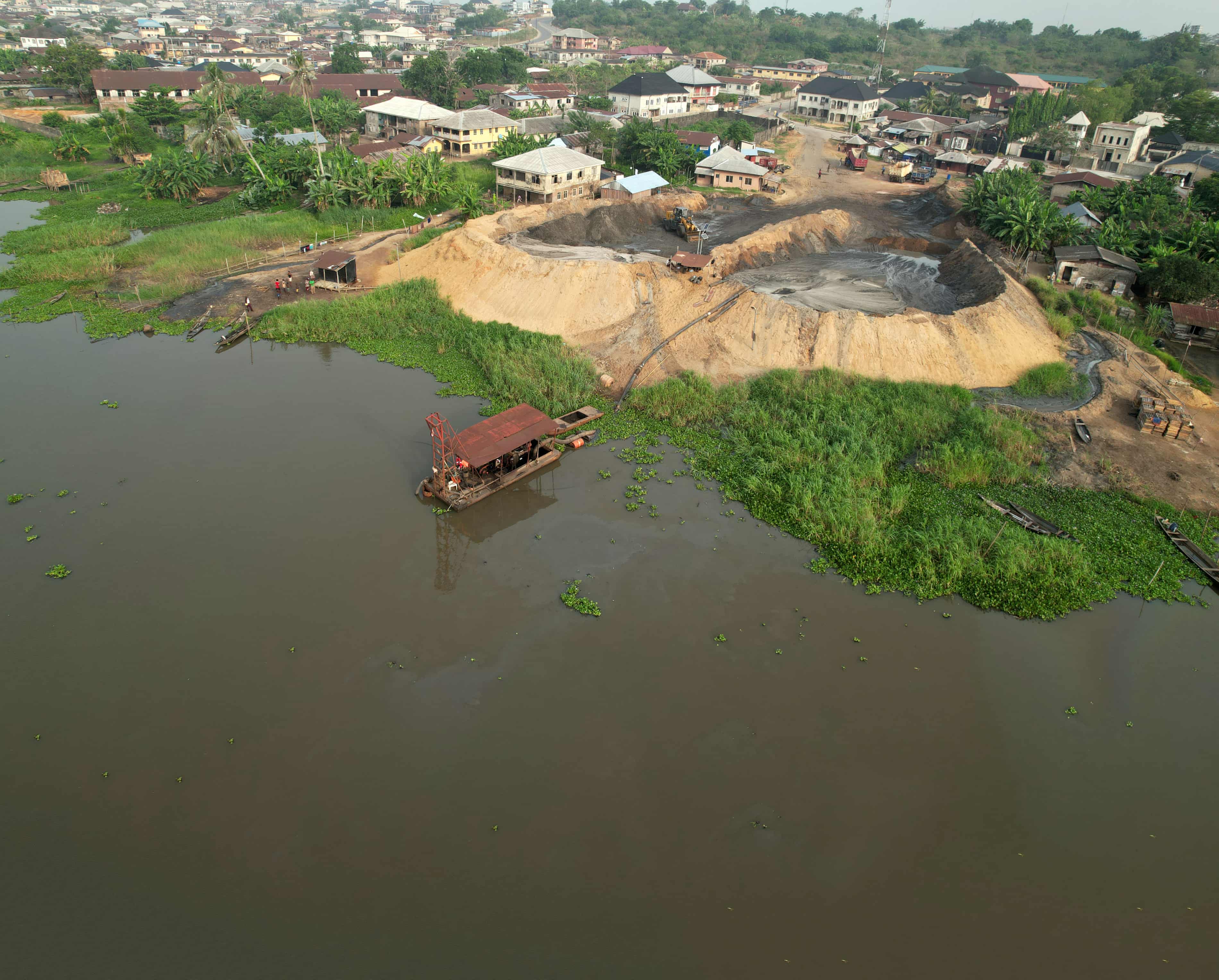 'The water is no longer our friend': how dredging is pushing Lagos Lagoon towards ecosystem collapse