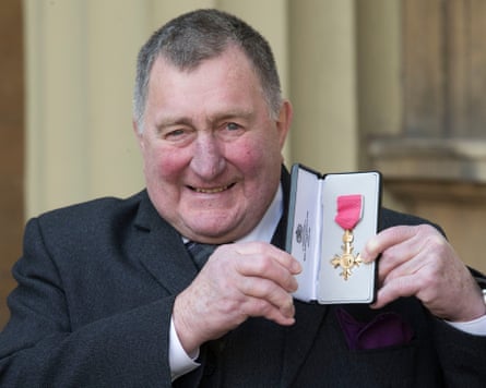 Ian McLauchlan with his OBE at Buckingham Palace in March 2018.