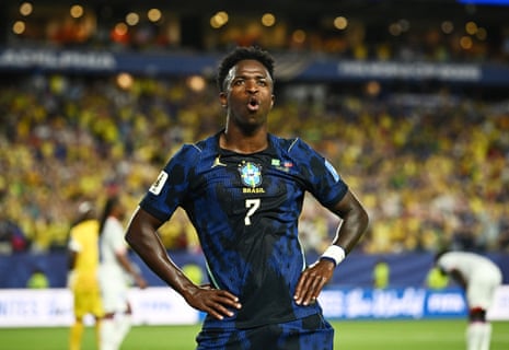 Brazil's Vinicius Junior celebrates scoring their third goal