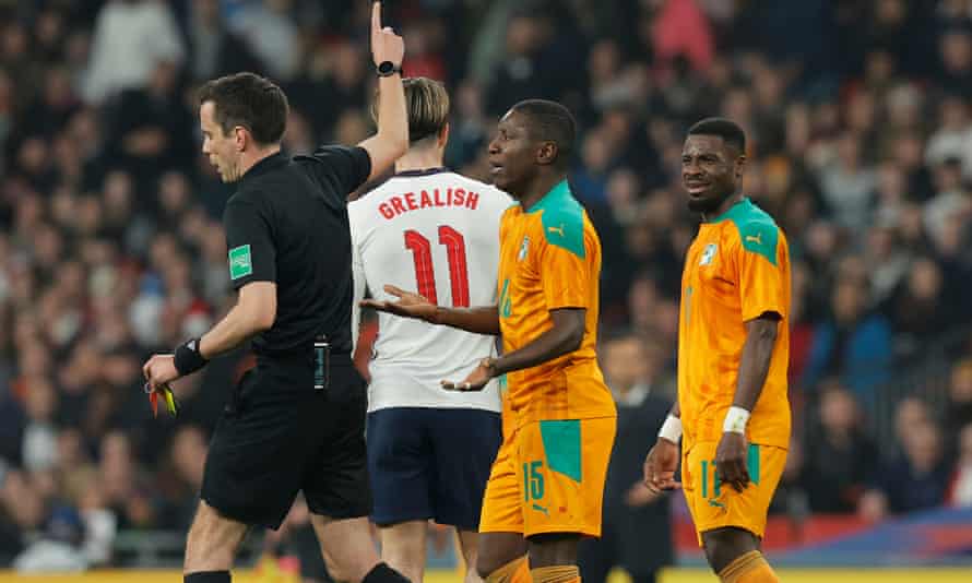 Ivory Coast captain Serge Aurier (right) is sent off in the first half against England