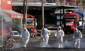 Workers use ozone to sanitise the Food Market area in Guadalajara, Mexico on April 28, 2020.