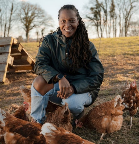 Michelle Burton with chickens at Jamie’s Farm, near Monmouth, Wales, where she used to work