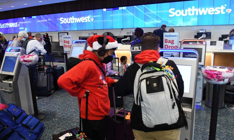 People checking in for their flights at Orlando International airport in the US