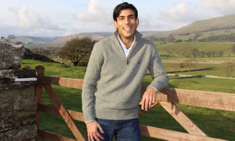Rishi Sunak pictures smiling at a gate with the Dales in the background
