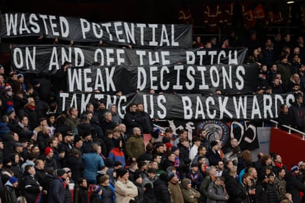 20 January 2024Crystal Palace fans protest about mismanagement of the club at a match against Arsenal at the Emirates Stadium. Arsenal won 5-0.