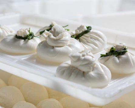 Pretty white parcels on a production line.