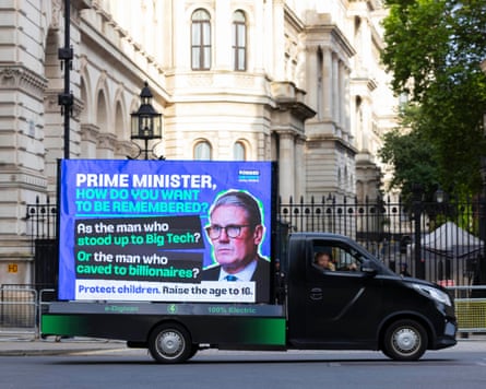 mobile billboard attached to vehicle on street