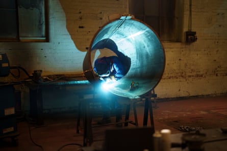 A technician welding a taper bowl for a centrifuge at the Thomas Broadbent & Sons factory in Huddersfield