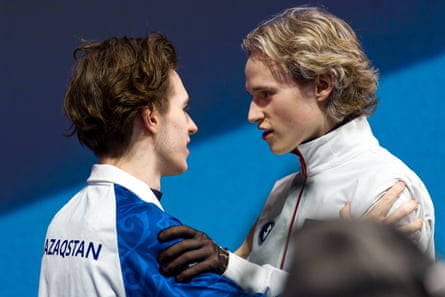 Ilia Malinin congratulates Kazakhstan’s Mikhail Shaidorov on his gold medal.
