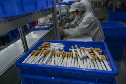 Workers box e-cigarettes on the production line at First Union, one of China’s leading manufacturers of vaping products.