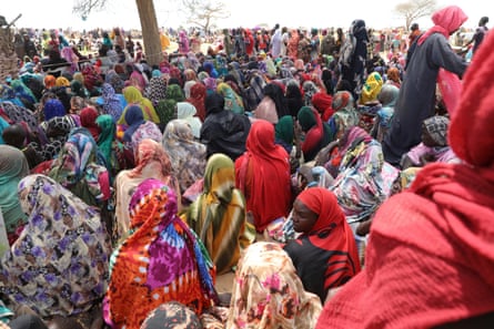 Sudanese refugees who fled the conflict gather at a refugee camp in Chad.