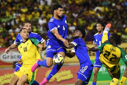 Curacao’s Roshon Van Eijma fights for the ball.
