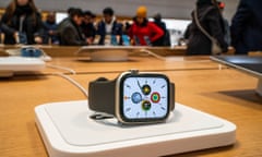 An Apple smartwatch is displayed as customers visit the Apple store in New York, 26 December 2023. 