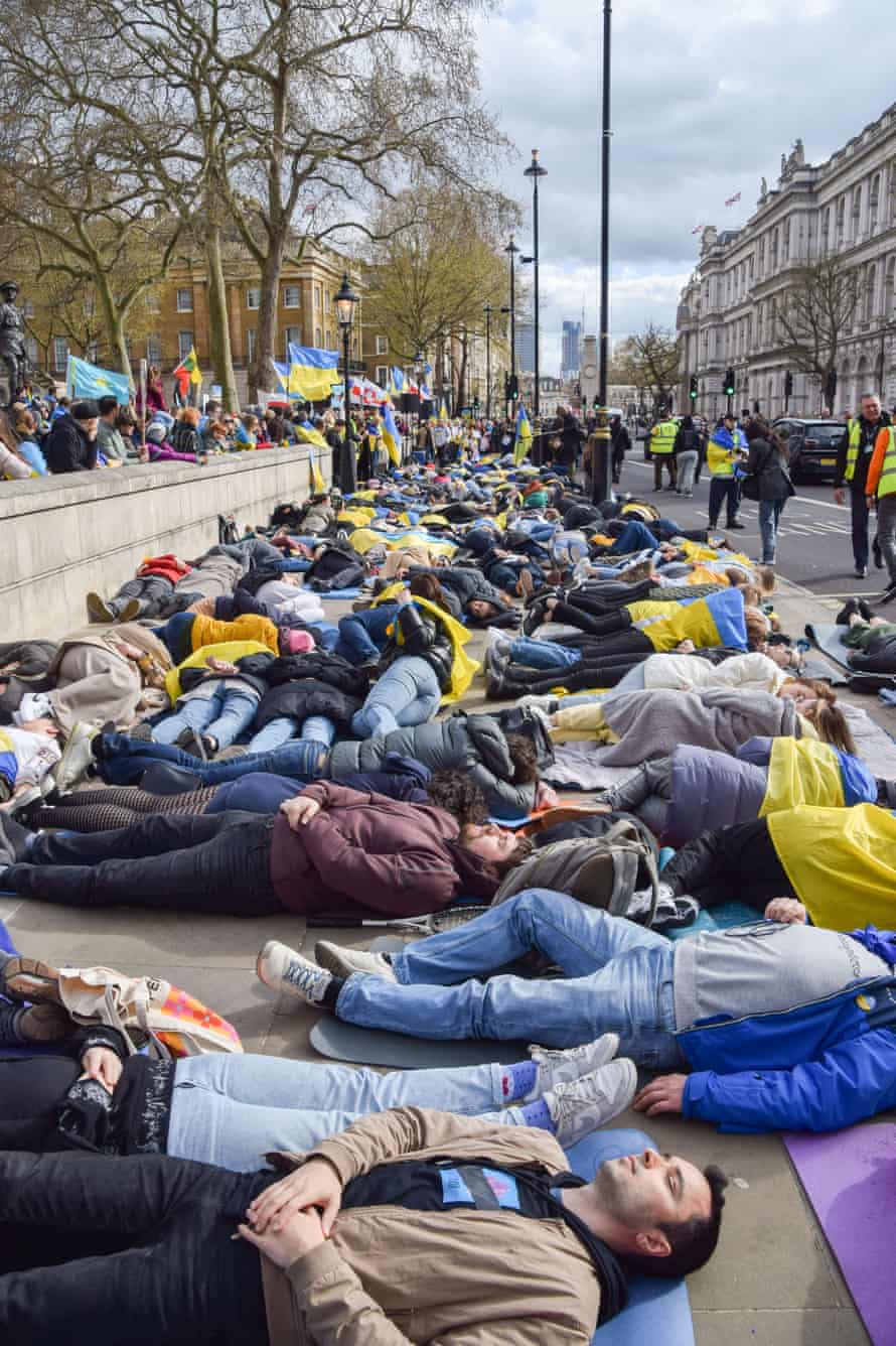 Protesters seen on the street outside Downing St, London, England, United Kingdom.
