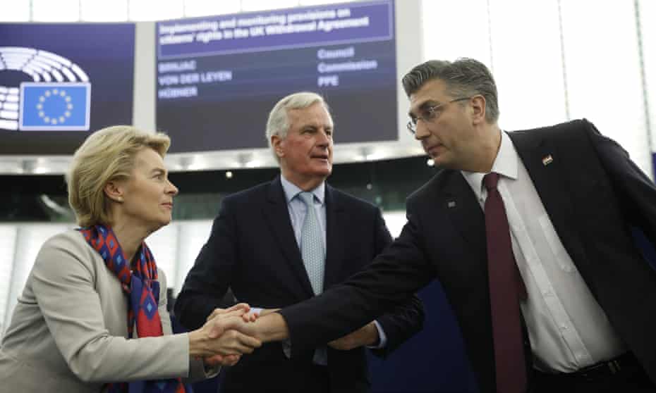 The European commission president, Ursula von der Leyen, left, and the EU chief negotiator, Michel Barnier, centre, welcome the Croatian prime minister, Andrej Plenkovic. 