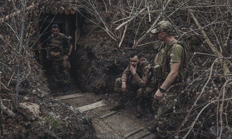 Soldiers of the 80th brigade outside their trench.