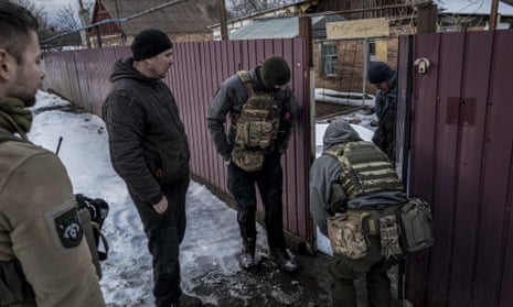 Volunteers from a multinational evacuation group try to evacuate local residents from the city of Bakhmut.