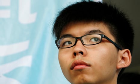 Student leader Joshua Wong looks on before a verdict outside a court in Hong Kong.