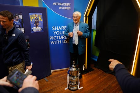 Derek Temple, the former Everton and England forward, prepares to have photos with fans and a replica FA Cup in St Luke’s Church