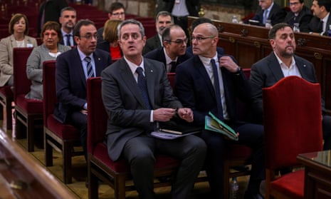 The 12 separatist leaders sit at their trial at the Spanish supreme court in Madrid.
