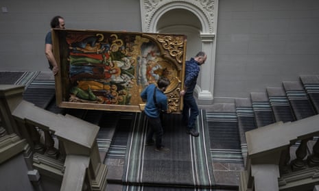 Workers move the Annunciation to the Blessed Virgin of the Bohorodchany Iconostasis in the Andrey Sheptytsky National Museum as part of safety preparations in the event of an attack in the western Ukrainian city of Lviv.