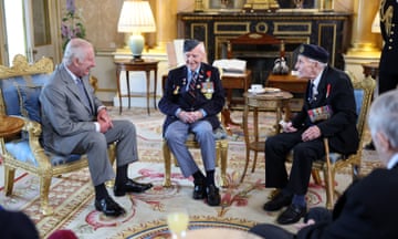 King Charles III sits in a semi-circle with D-day veterans Bernard Morgan and John Dennett in a room in Buckingham Palace, that will feature in the BBC's D-Day 80: Tribute to the Fallen