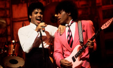 Morris Day (left) and the Time perform in Chicago, Illinois, in 1983
