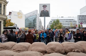Locals and visitors mingle at Checkpoint Charlie