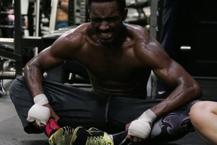 Large dipper, boxing and bikers in LA: Wembley to Soweto initiative 2022 – photograph essay | Pictures 36 The Sweat Box – a boxer stretches out before entering the ring