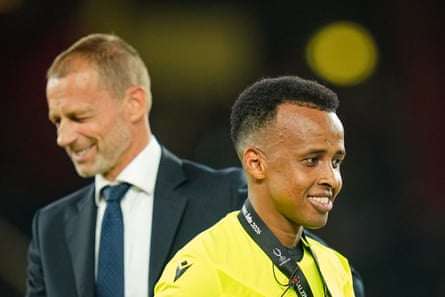 Uefa president Aleksander Ceferin with referee Omar Artan