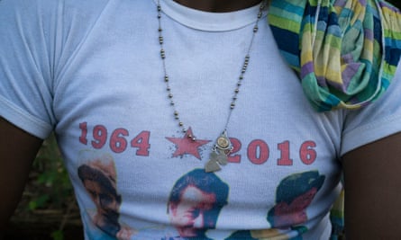 A guerrilla fighter wears T-shirt depicting Farc commanders and their 52-year struggle.