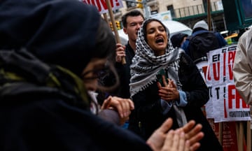  A small group of pro-Palestinian protestors chant outside  Columbia University in New York to cheer on students camping inside.