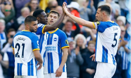 Danny Welbeck is congratulated by his teammates after scoring Brighton’s fourth goal of a 6-0 win