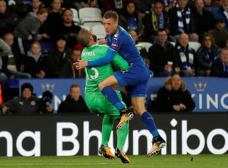 West Brom keeper Boaz Myhill clatters into Leicester City’s Jamie Vardy and ends up in the referee’s book.