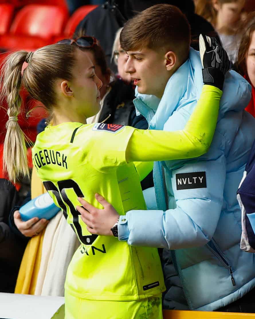 Women’s FA Cup photo essay – road to Wembley, fourth round: Nottingham Forest v Manchester City | Women's FA Cup 29 Manchester City goalkeeper Ellie Roebuck celebrates their victory with family and friends.
